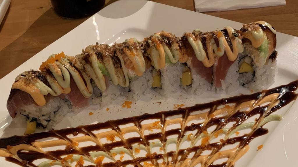 522. House Special Roll · Unagi, mango roll topped with spicy tuna, crab, tuna, salmon, avocado, tobiko and special sauce.