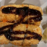 602. Crunchy California Roll · Crab meat, avocado, breaded and fried, topped with unagi sauce