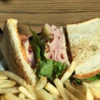 Hot Ham + Swiss · Pit Ham, Bacon, Swiss, & House Aioli on Sweet Roll