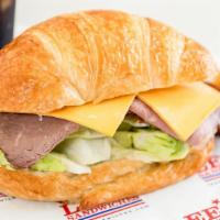 35. Roast Beef and Cheese Croissant · Roast beef and cheese in a croissant sandwich.