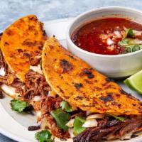 Birria Tacos · Birra, the traditional Mexican beef stew.