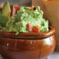 Guacamole & Chips · Fresh guacamole with pico, cotija, and tortilla chips.