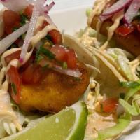 Canastaco Fish Tacos (2) · #1 food truck item. Two big, crunchy corn tortilla, wrapped in a soft corn tortilla and fill...