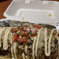 Wet Burrito · Super burrito smothered in red, green, or mole sauce and melted jack cheese, pico de gallo, ...