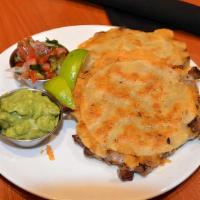 Chiquitas Corn or Flour · Small quesadillas, choice of meat.