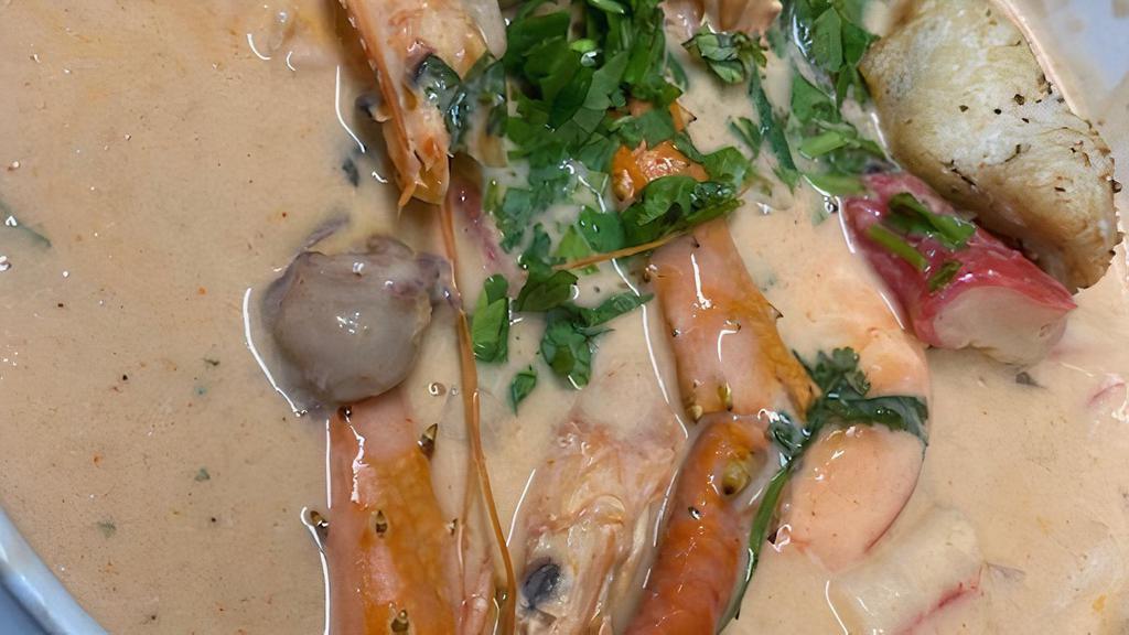 Seafood Stew Soup/Crema de Mariscos  · Squid, octopus, surimi, pollock, threadfin bream fish, sour cream, coco milk, eggs, cilantro, onion, tomato sauce, crab legs, fish, shrimp.
