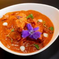 Butter Chicken Curry · Tandoori chicken pieces pulled off the bone cooked in a luscious blend of cream and tomato s...