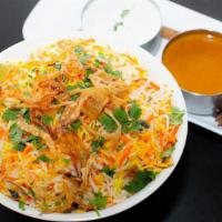 Veg Biryani · Fresh cut vegetables marinated with special spices tossed in curry sauce flavored with spice...
