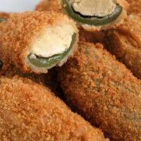 Jalapeno Poppers  · Cheese filled and fried Jalapeno
