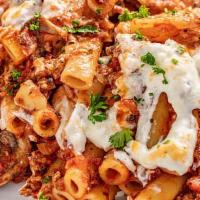 Baked Zitti Meatballs · Baked Zitti pasta with Mozzarella, Bacon and Parmesan cheese and 3 Meatballs. Served with ho...