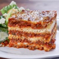 Meat Lasagna · Ground Beef, Mozzarella and  Parmesan  and Ricotta cheese and Marinara sauce. Served with ho...