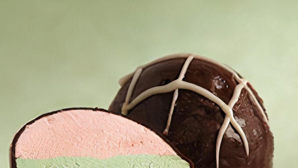 Strawberry Pumoni · Strawberry, pistachio and chocolate gelato all coated with chocolate & drizzled with white chocolate