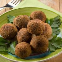 Falafel · Eight pieces. Chickpeas, onions, parsley, garlic, spices, deeply fried, served with tahini d...