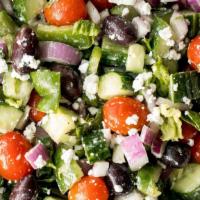Greek Salad · Tomatoes, lettuce, onion, Kalamata olives, feta cheese, with balsamic dressing.