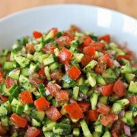Jerusalem Salad · Cucumbers finely chopped tomatoes, red onion, parsley, vinegar, lemon squeeze with salt and ...