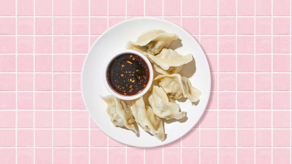 Steamed Shrimp, Chive, and Pork Dumplings · Six steamed shrimp, chive, and pork dumplings with dipping sauce.