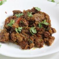Mutton aka Goat Sukka · Goat Cubes cooked and pan fried with Sukka masala/spices