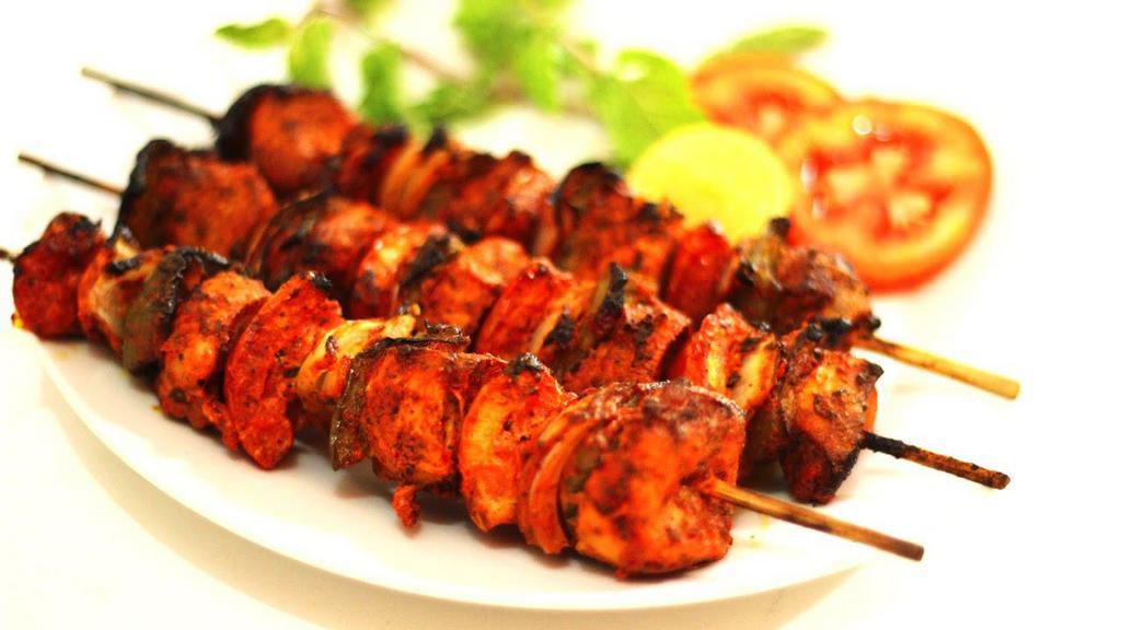 Chicken Tikka Kabab · Tender boneless chicken cubes marinated in yogurt and mild spices and grilled in clay oven.