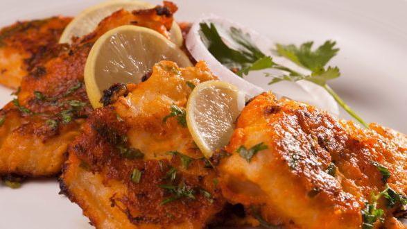 Lahori fish tikka · Fish fillet marinated in special lahori masala and cooked in clay oven.