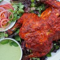 Tandoori Chicken (Full) ( 4 pcs, 2 leg, 2breast with wings) · Whole chicken marinated in yogurt with special herbs, spices and cooked in tandoor