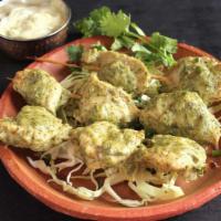 Murg Malai Kebab · Tender boneless thigh chicken cubes marinated in yogurt, mayo, butter and mild spices and gr...