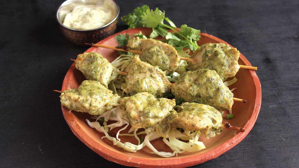 Murg Malai Kebab · Tender boneless thigh chicken cubes marinated in yogurt, mayo, butter and mild spices and grilled in clay oven.