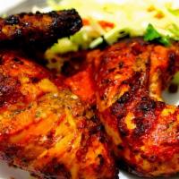Tandoori Chicken (half) (2 pcs, 1 leg, 1breast with wings) · Half Whole chicken marinated in yogurt with special herbs, spices and cooked in tandoor