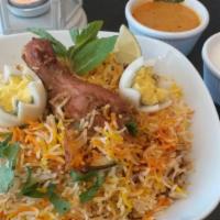 Hyderabadi Chicken Dum Biryani · Chicken with bones marinated with herbs and special spices, cooked in low heat with long gra...