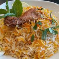 Hyderabad Boneless Chicken Dum Biryani · Boneless chicken marinated with herbs and special spices, cooked with long grain basmati rice.