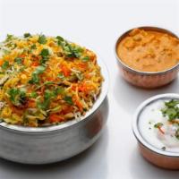 Hyderabadi Veg Dum Biryani · Vegetables marinated with herbs, spices, and special masala, cooked in low heat with long gr...