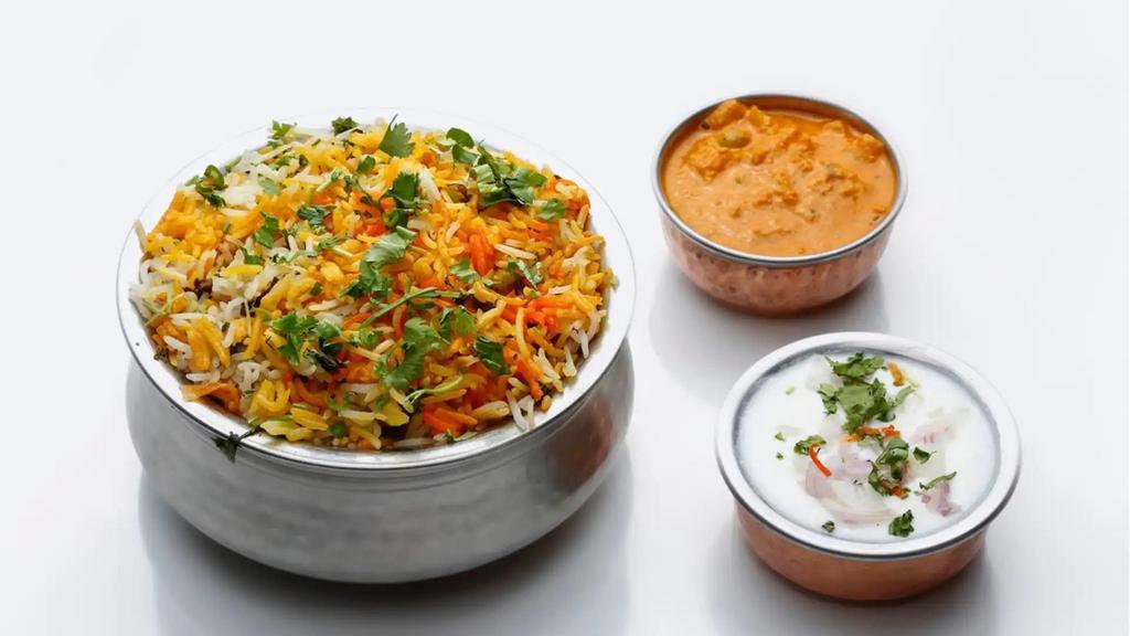 Hyderabadi Veg Dum Biryani · Vegetables marinated with herbs, spices, and special masala, cooked in low heat with long grain basmati rice.