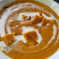 Paneer Tikka Masala · Paneer cooked in a rich creamy Indian red sauce.