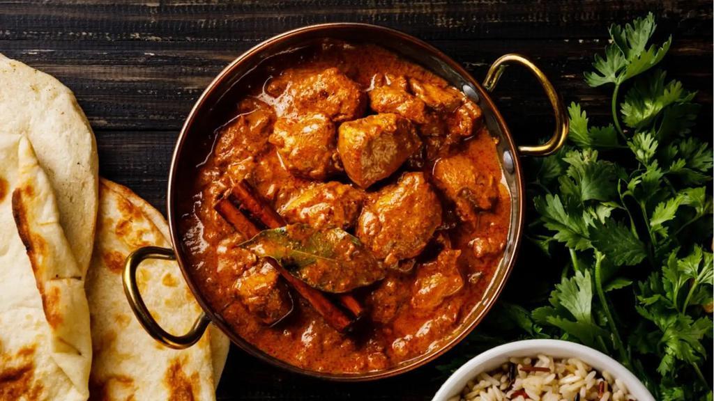 Chicken Tikka Masala · Boneless chicken breast cooked in clay oven and simmered in fenugreek flavored plum tomato sauce.