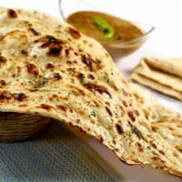 Butter Naan · Soft leavened white bread cooked in clay oven.