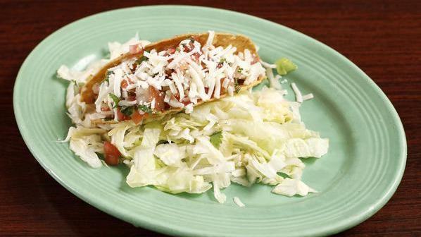 Crispy Taco · Your choice of meat, lettuce, cheese, pico de gallo, sour cream and salsa.