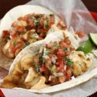 Fish Taco · Lightly battered or grilled with chipotle remoulade.