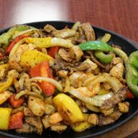 Cielo, Mar Y Tierra Fajitas · Mixed with grilled chiken, grilled steak, and shrimps.