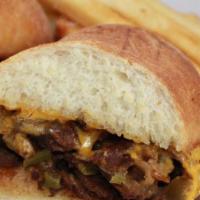 Cheesesteak Sandwich · Cal: 1170. Grilled steak slices with peppers and onions smothered in melted American cheese ...