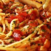 Spaghetti · Spaghetti pasta with your choice of chicken, Italian sausage, or ground beef, mixed with you...