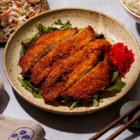 Chicken Katsu Plate · Fried chicken katsu with housemade teriyaki sauce, your choice of a base and house salad.
