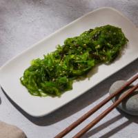Seaweed Salad · Classic seaweed salad with sesame seeds.