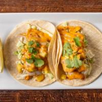 Street Style Fish Tacos · Gluten-free. Seasoned grilled cod & mild chipotle aioli in corn tortillas, topped with slaw ...