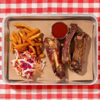 BBQ Smoked Babyback Beef Ribs · House smoked beef ribs served with your choice of 2 signature sides.