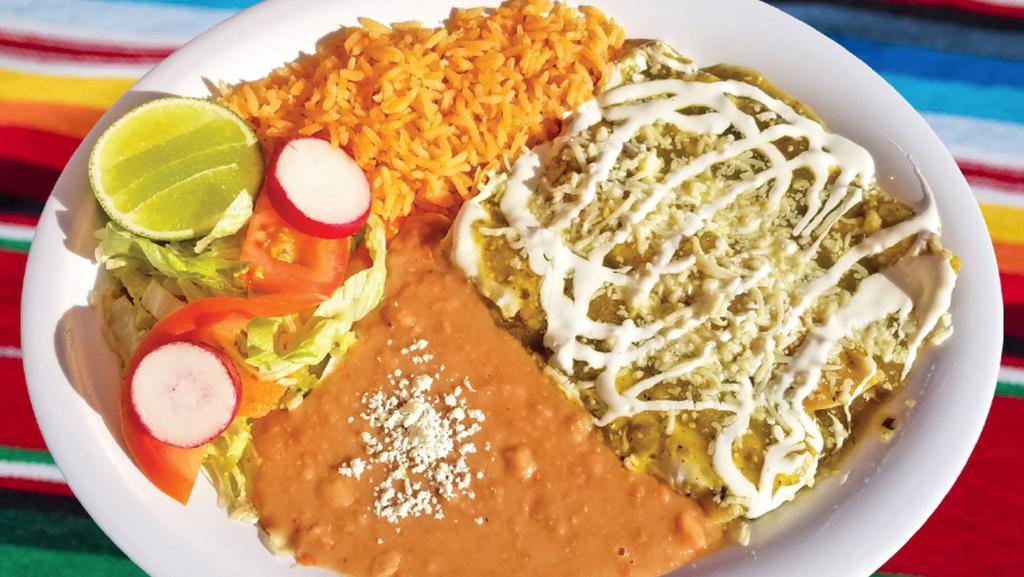 Enchiladas Suizas · Three enchiladas in green salsa. Served with rice, refried beans, and salad.