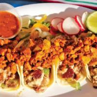 Alambre Especial · Four tacos with a combination of bell pepper, onions, bacon, beef, and topped with al pastor...