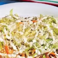 Mega Huarache · Your choice of meat, beans, salsa, lettuce, cheese, and sour cream on a thick corn tortilla.