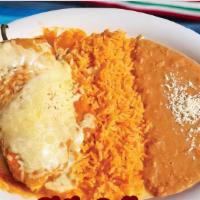 Chile Relleno · Poblano pepper stuffed with cheese and coated with a fried egg batter and more cheese. Serve...