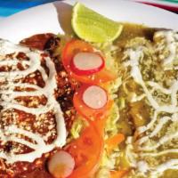 Enchiladas Campechanas · Four enchiladas, two green salsa and two red salsa, topped with sour cream and cheese. Serve...