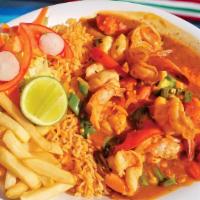 Camarones Rancheros · Shrimp sautéed in spicy tomato sauce with onions, jalapeños, and tomatoes. Served with salad...
