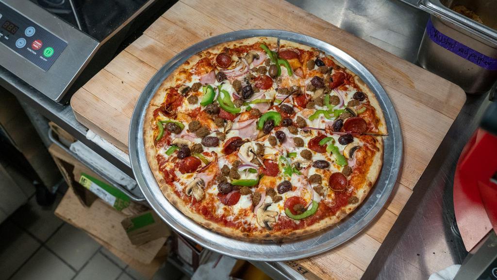 Baron Combo · Green peppers, red onions, mushrooms, sausage, black olives, pepperoni and ham
